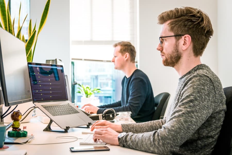 Developer at a laptop in a bright office